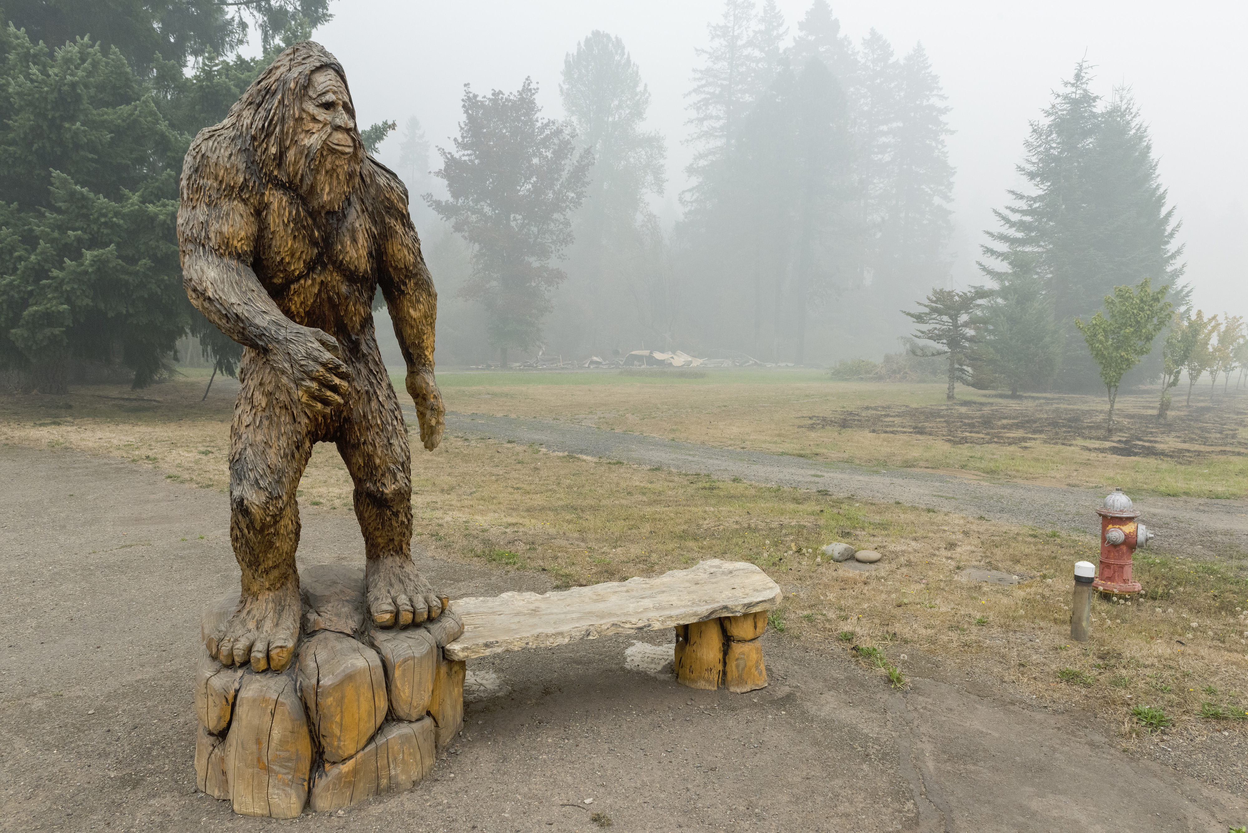 That's Forest, left, a gigantic Bigfoot figure at the Bigfoot
